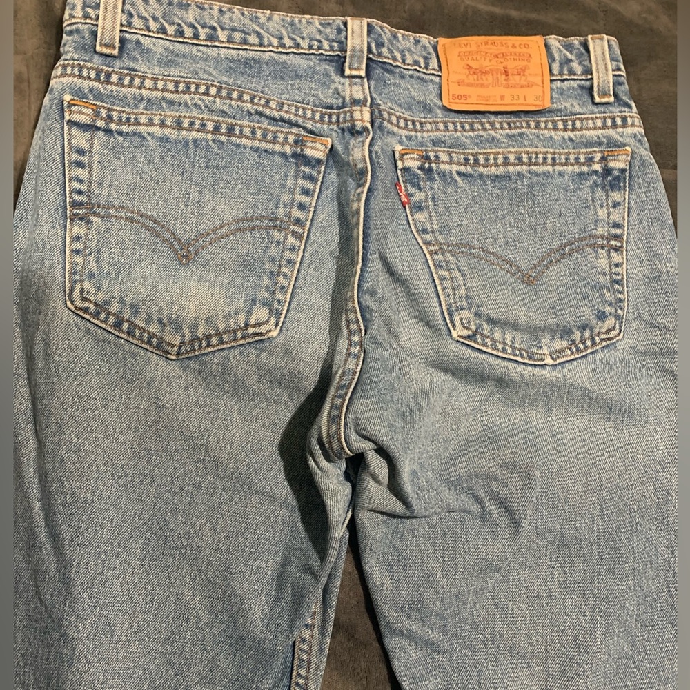 Levi’s 505 straight leg, regular fit jeans.